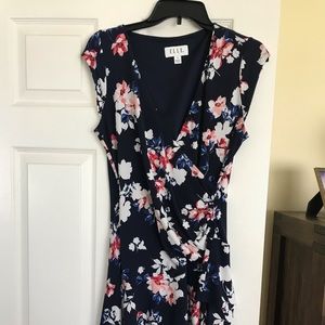 Short sleeved criss cross wrap dress.